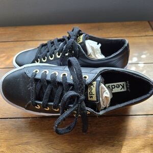 Keds Black Leather Lace-Up Sneakers with Gold Eyelets